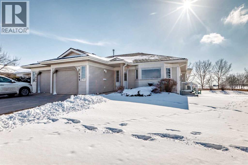 409 Hope Bay, Rural Rocky View County, Alberta  T1X 1G5 - Photo 3 - A2299222