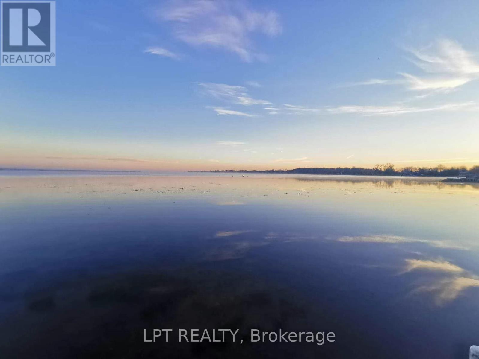 24 Lakeshore Road, Georgina (Virginia), Ontario  L0E 1N0 - Photo 3 - N12963136