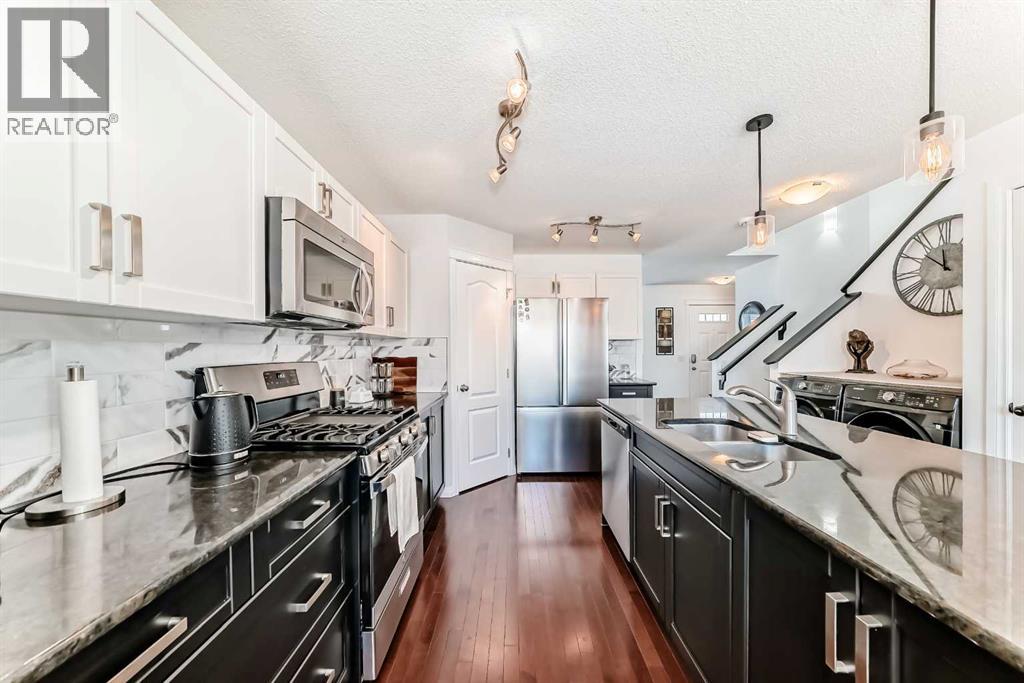 1264 Reunion Place NW, Airdrie, Alberta  T4B 0M4 - Photo 7 - A2295646