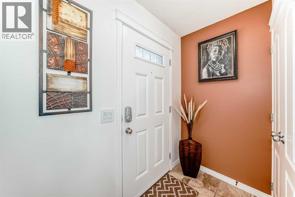 1264 Reunion Place NW, Airdrie, Alberta  T4B 0M4 - Photo 4 - A2295646