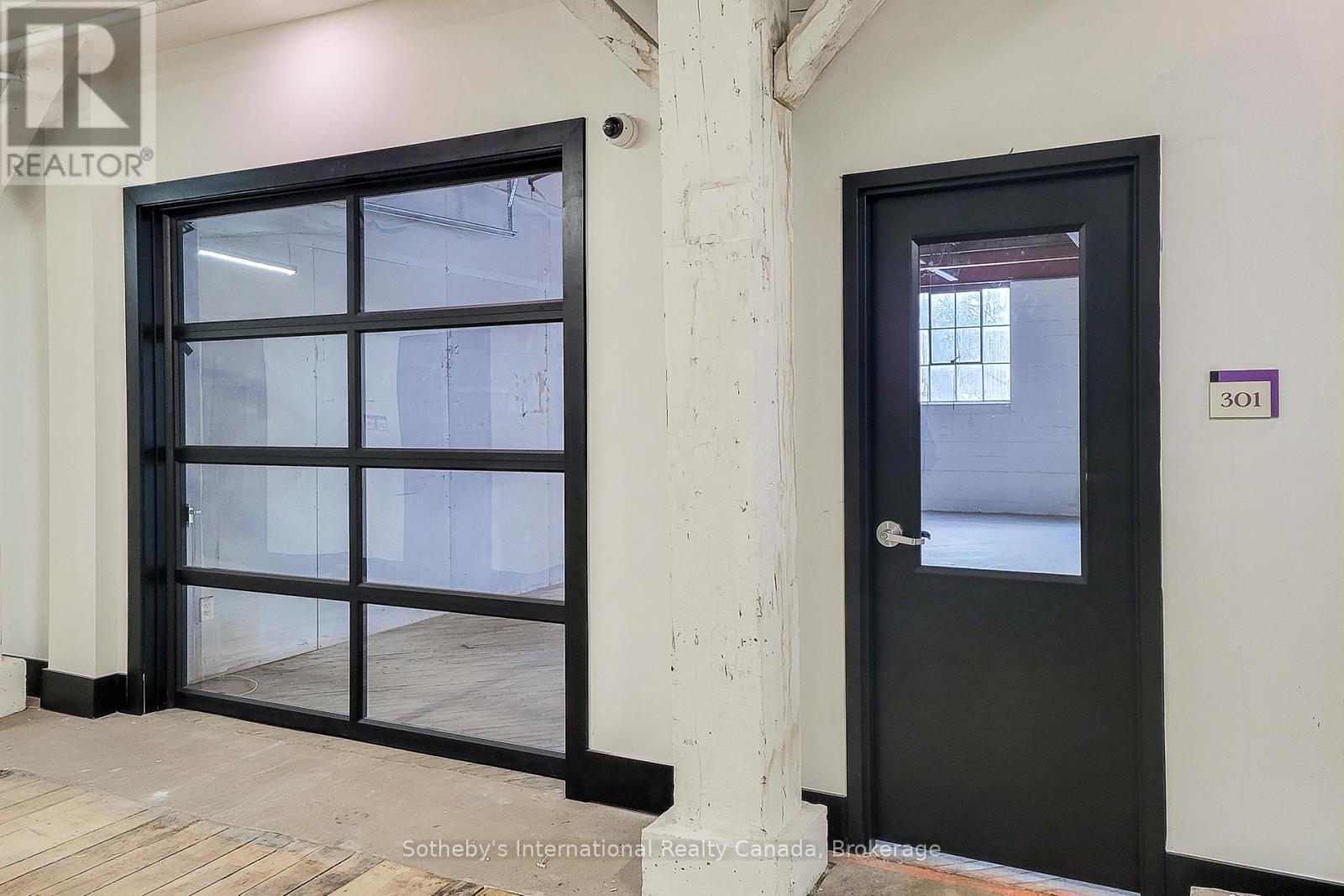 301 - 64 Hatt Street, Hamilton, Ontario  L9H 7T6 - Photo 2 - X12963836