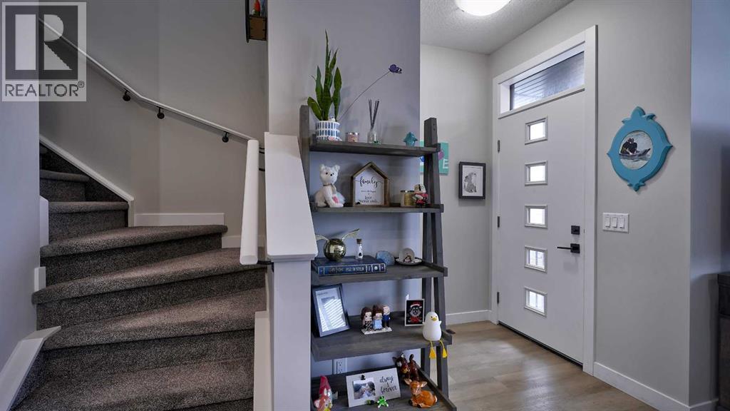 155 Wolf Hollow Park SE, Calgary, Alberta  T2X 4M8 - Photo 2 - A2295669