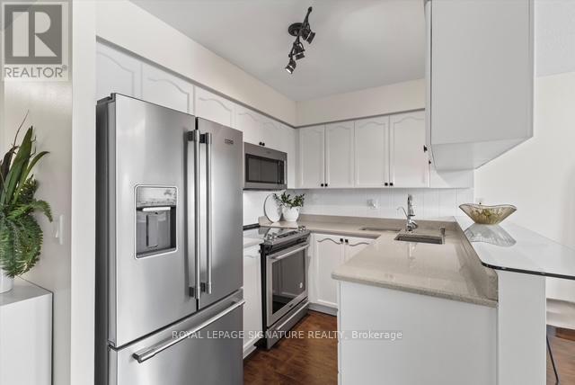 207 - 1150 Parkwest Place, Mississauga, Ontario  L5E 3K4 - Photo 5 - W12963472