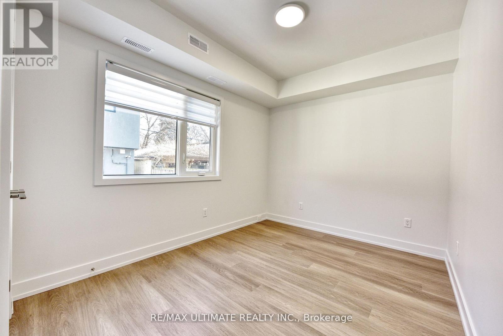 Main Floor - 385 Mcroberts Avenue, Toronto, Ontario  M6E 4R1 - Photo 10 - W12963568