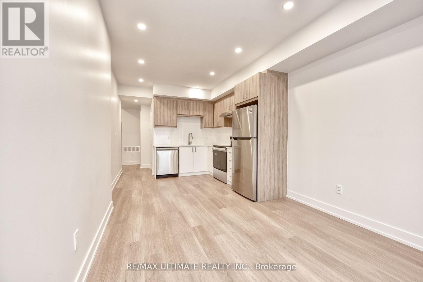 Main Floor - 385 Mcroberts Avenue, Toronto, Ontario  M6E 4R1 - Photo 5 - W12963568