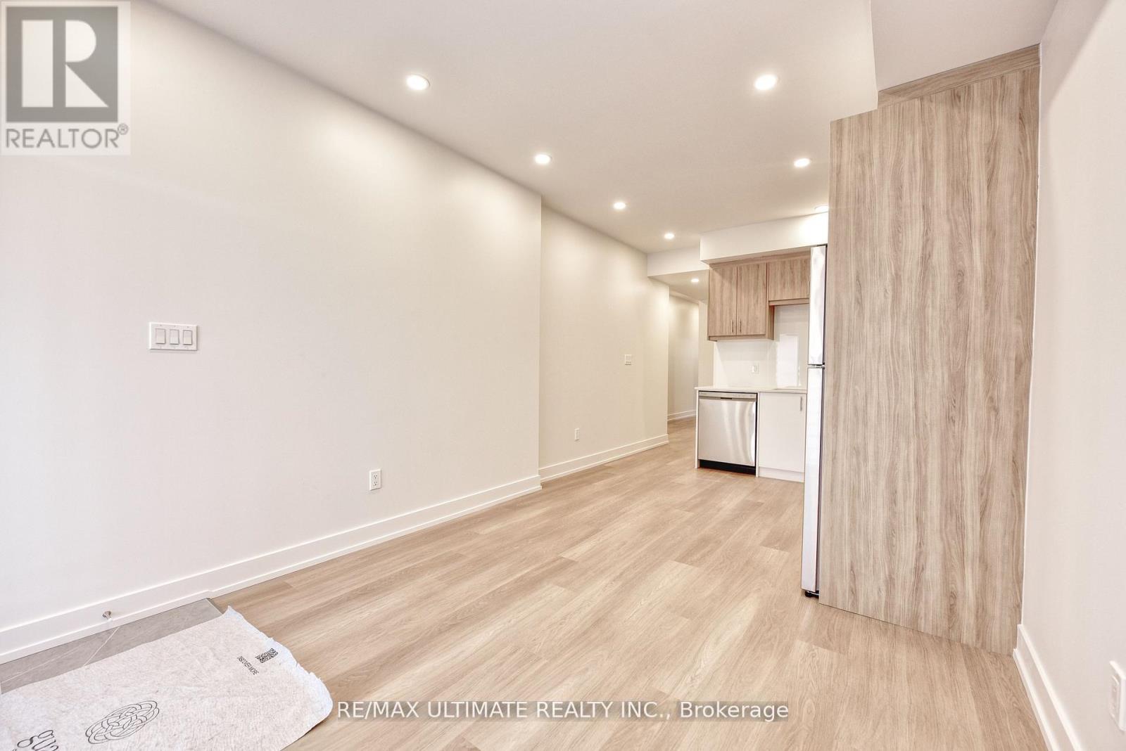 Main Floor - 385 Mcroberts Avenue, Toronto, Ontario  M6E 4R1 - Photo 6 - W12963568