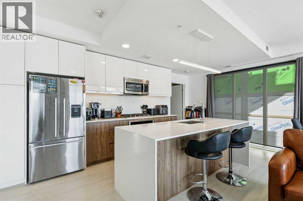 211, 327 9a Street NW, Calgary, Alberta  T2N 1T7 - Photo 2 - A2298925