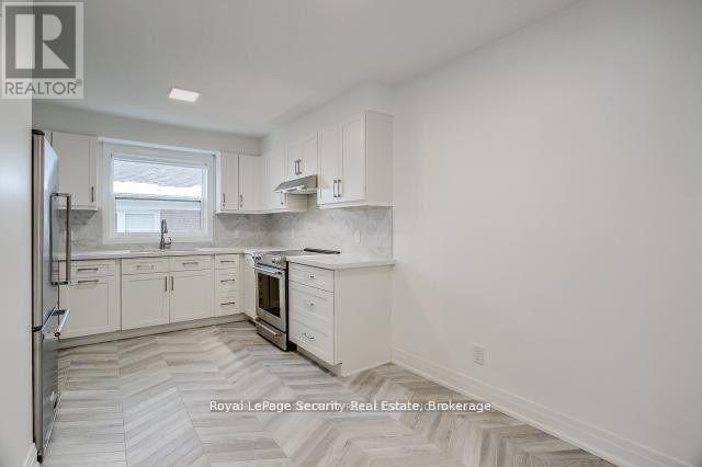 2 - 109 Stephen Drive, Toronto, Ontario  M8Y 3M8 - Photo 7 - W12964106