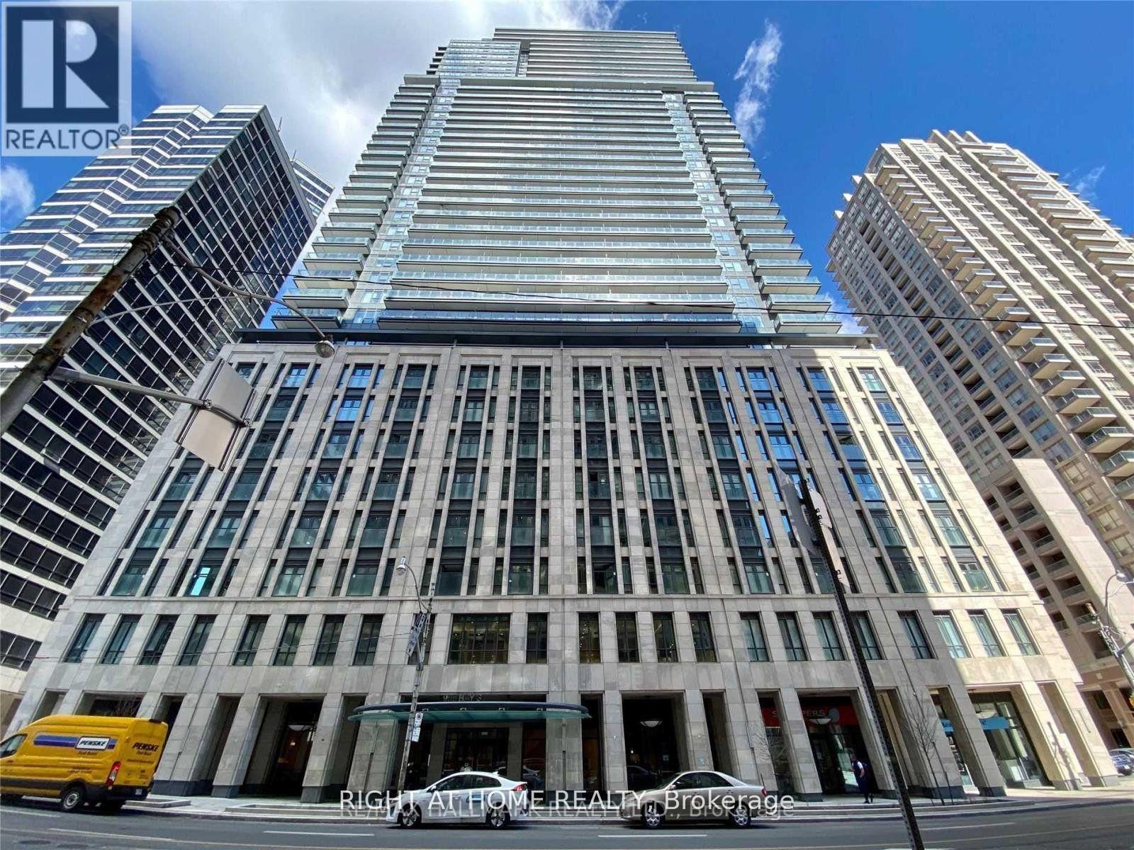 Welcome to one of Bay Street's most Iconic Residences-an Elegant Conversion of the Historic Sutton Place Hotel, Blending Timeless Art Deco Design with Modern Downtown Living. Perched on the 24th Floor. One-bedroom Plus Den offers Breathtaking Views and Abundant Morning Sunshine, Bright East-Facing City Views. The Functional Layout Includes a Prime Bedroom with a Large Window, a Walkout balcony, and a Versatile Den, Ideal for a Home Office or Study Area, Perfect for young Professionals or Students Seeking a Stylish and Efficient Urban Home. Residents enjoy an Impressive Lobby with Grand Art Deco staircase, a Spacious Resident Lounge, and Friendly Concierge Service. Premium Amenities include a Well-Equipped Gym, Pool, Hot tub, and party rooms- everything you need without Leaving Home. Just steps to the Subway, TTC, Office Towers, Yorkville, shopping, hospitals, U of T, Ryerson, and the YMCA. (id:48254)