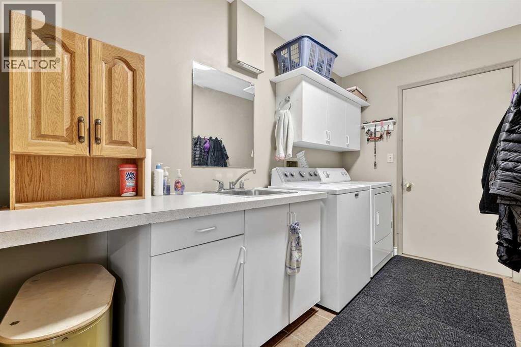 336 Wild Rose Close, Rural Rocky View County, Alberta  T0L 0K0 - Photo 12 - A2298709