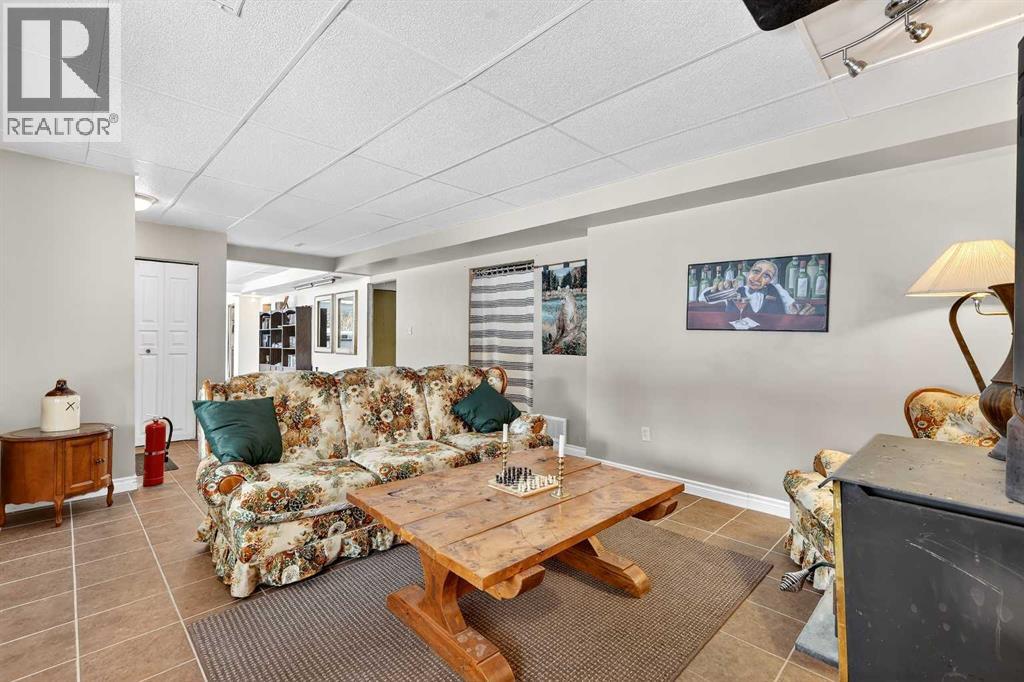 336 Wild Rose Close, Rural Rocky View County, Alberta  T0L 0K0 - Photo 19 - A2298709