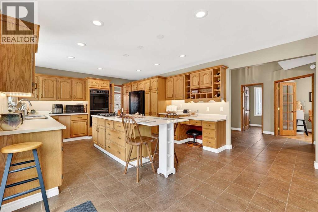 336 Wild Rose Close, Rural Rocky View County, Alberta  T0L 0K0 - Photo 8 - A2298709