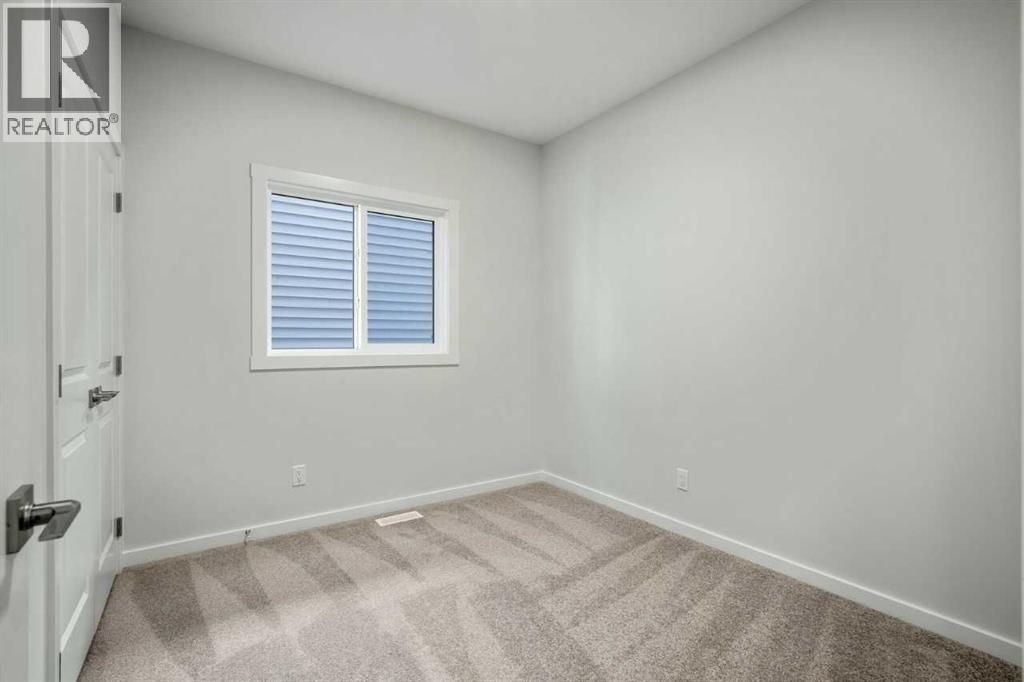11 Heritage Link, Cochrane, Alberta  T4C 2J8 - Photo 15 - A2275697