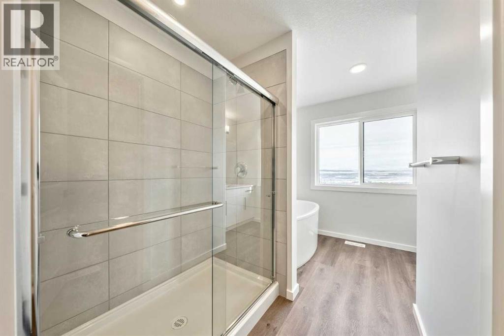 24 Heritage Link, Cochrane, Alberta  T4C 2J8 - Photo 11 - A2287354