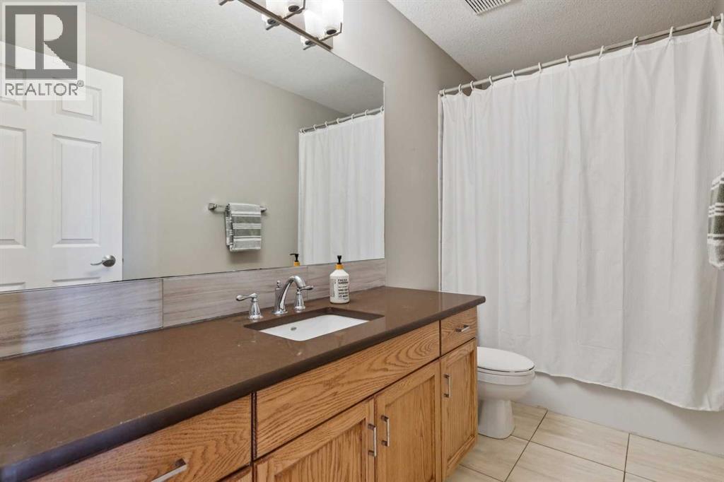 107 Sheep River Bay, Okotoks, Alberta  T1S 1R3 - Photo 22 - A2298402