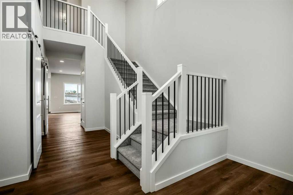 27 Heritage Link, Cochrane, Alberta  T4C 2J8 - Photo 5 - A2299568