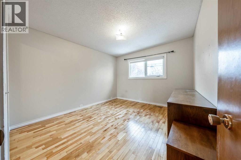 1017 Mckinnon Drive NE, Calgary, Alberta  T2E 6A7 - Photo 16 - A2298191