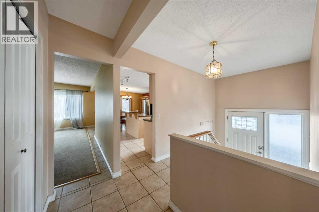 1017 Mckinnon Drive NE, Calgary, Alberta  T2E 6A7 - Photo 4 - A2298191