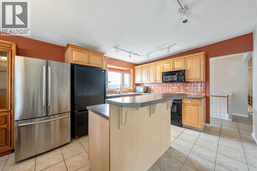 1017 Mckinnon Drive NE, Calgary, Alberta  T2E 6A7 - Photo 7 - A2298191