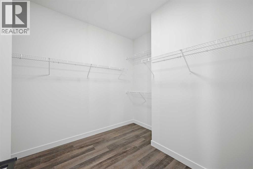 115 Chelsea Channel, Chestermere, Alberta  T1X 2T1 - Photo 30 - A2298972