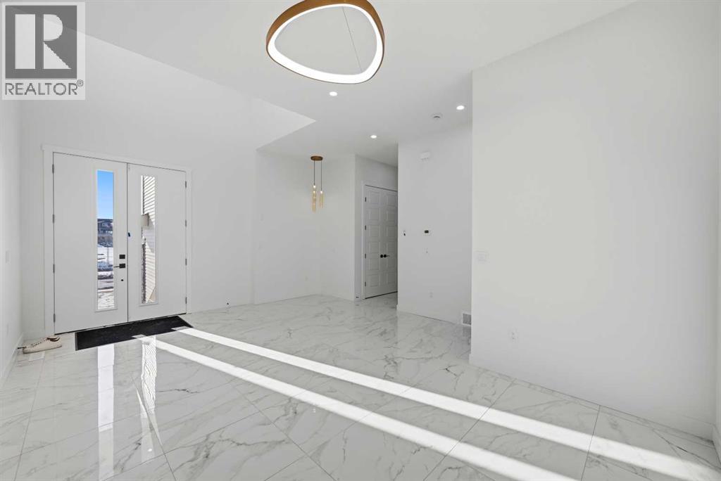 115 Chelsea Channel, Chestermere, Alberta  T1X 2T1 - Photo 7 - A2298972