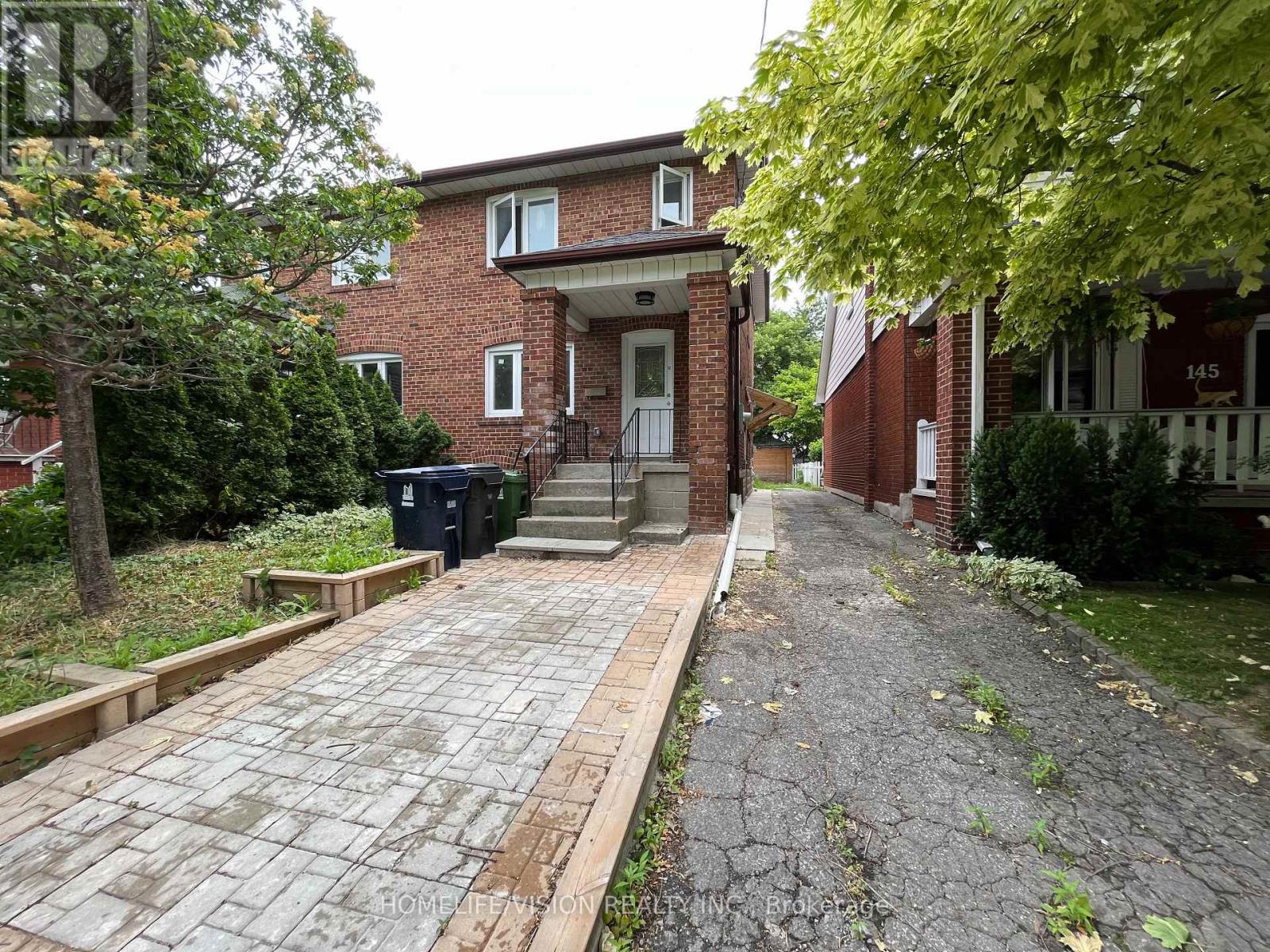Main - 143 Belgravia Avenue, Toronto, Ontario  M6E 2M6 - Photo 2 - W12965572