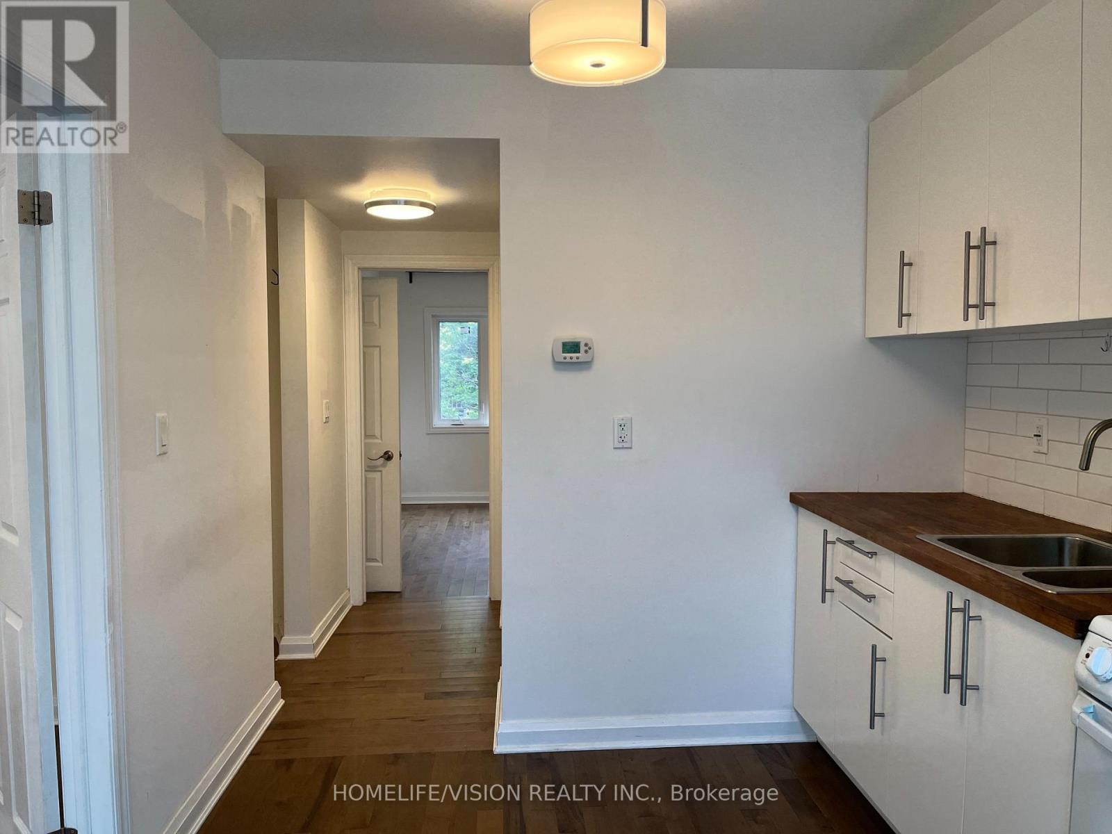 Main - 143 Belgravia Avenue, Toronto, Ontario  M6E 2M6 - Photo 8 - W12965572