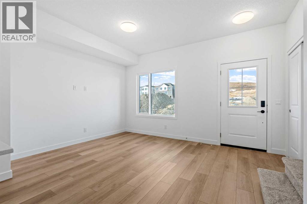 1007, 25 Wildwoods Court Sw, Airdrie, Alberta  T4B 5V7 - Photo 5 - A2283457