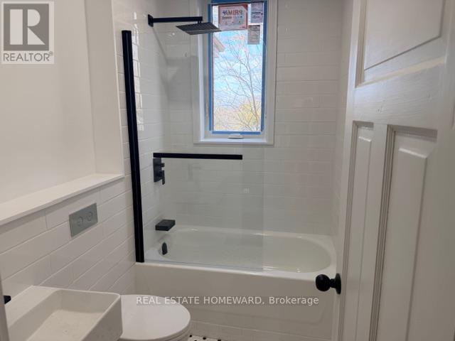 48 Harvie Avenue, Toronto, Ontario  M6E 4K3 - Photo 5 - W12965962