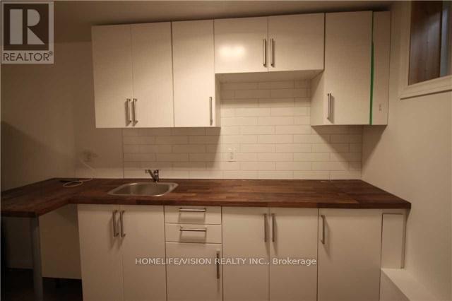 Bsmt - 143 Belgravia Avenue, Toronto, Ontario  M6E 2M6 - Photo 10 - W12965978