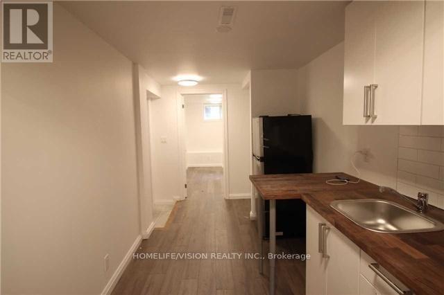 Bsmt - 143 Belgravia Avenue, Toronto, Ontario  M6E 2M6 - Photo 9 - W12965978