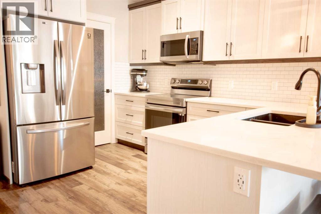 316 Greenwood Place, Coalhurst, Alberta  T0L 0V2 - Photo 7 - A2299132