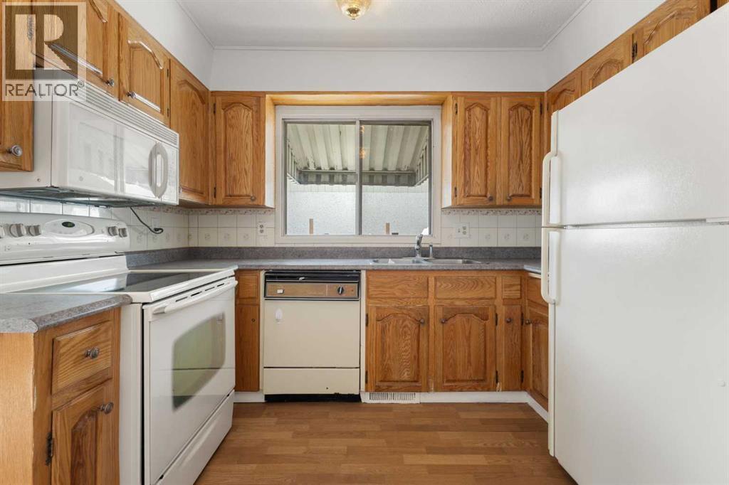 5216 Marian Road NE, Calgary, Alberta  T2A 2Y2 - Photo 6 - A2298591