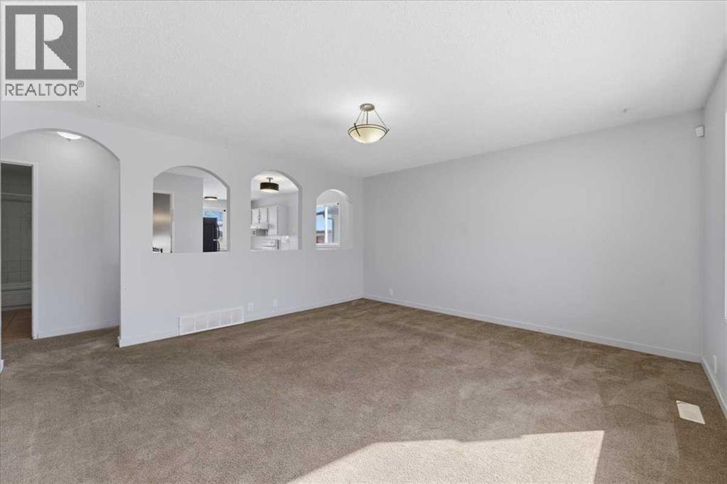 716 Whitemont Drive NE, Calgary, Alberta  T1Y 2Z8 - Photo 2 - A2298581