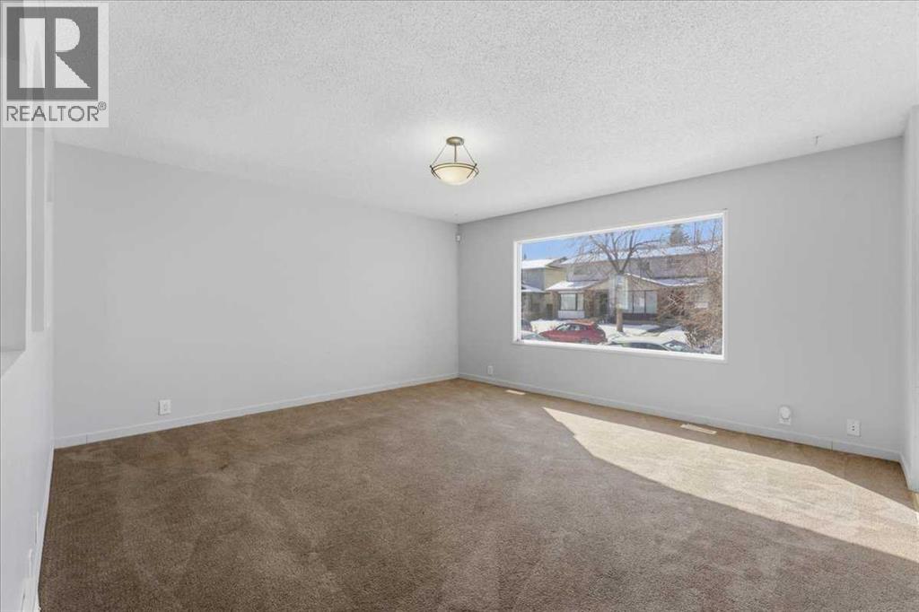 716 Whitemont Drive NE, Calgary, Alberta  T1Y 2Z8 - Photo 4 - A2298581