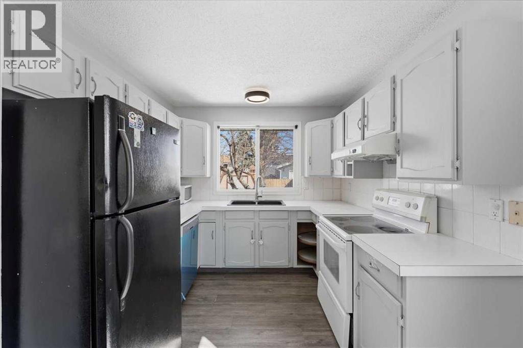 716 Whitemont Drive NE, Calgary, Alberta  T1Y 2Z8 - Photo 9 - A2298581