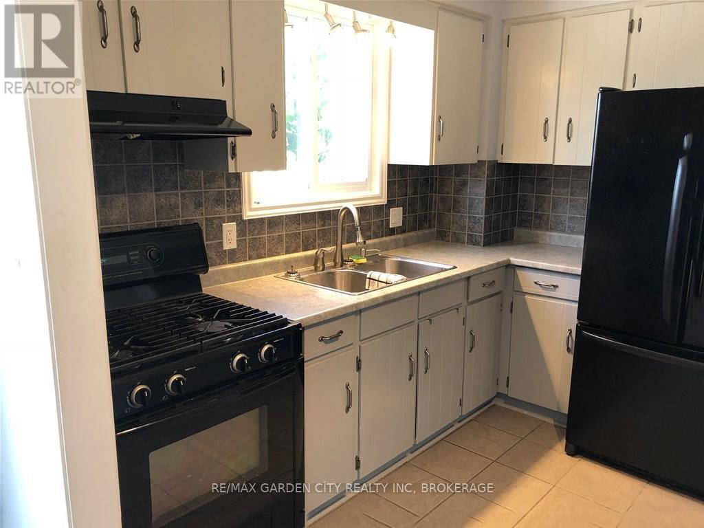 29 St. Hilda's Court, St. Catharines, Ontario  L2R 7H1 - Photo 6 - X12966422