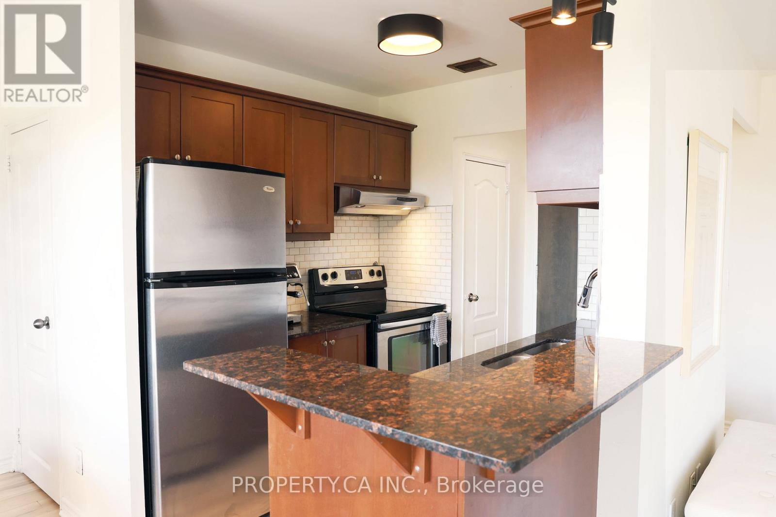 303 - 60 Gulliver Road, Toronto, Ontario  M6M 2M6 - Photo 2 - W12966346