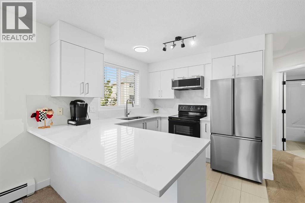 1211, 7451 Springbank Boulevard SW, Calgary, Alberta  T3H 4K5 - Photo 3 - A2286193
