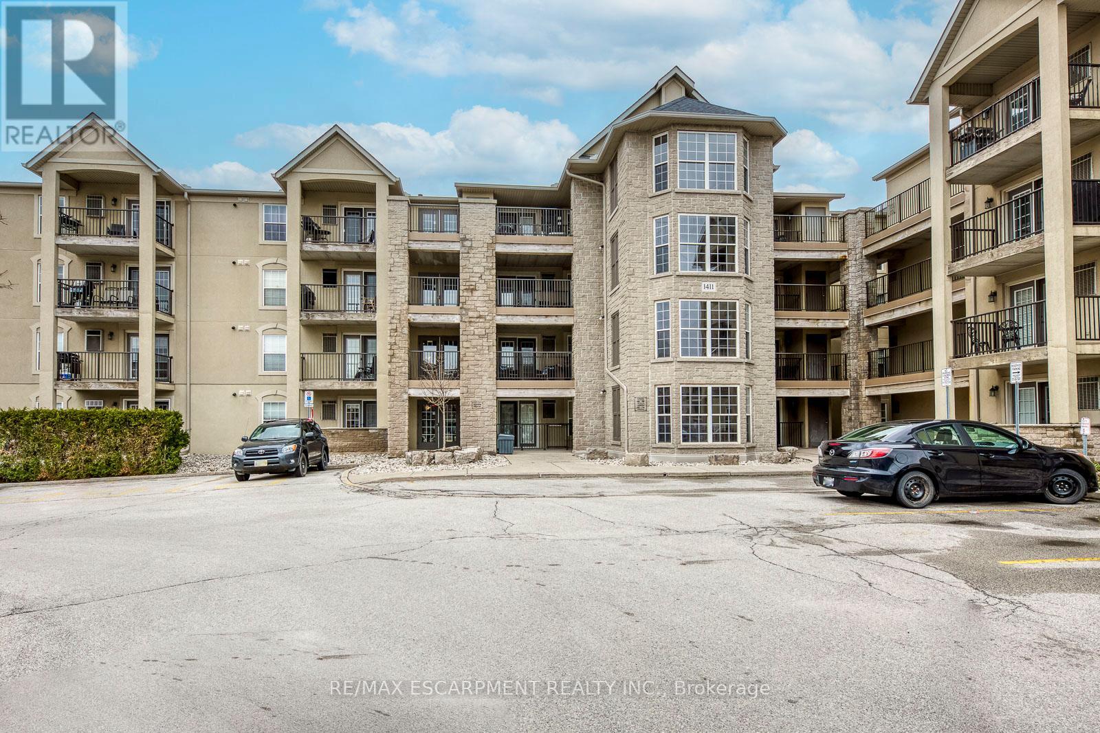 302 - 1411 Walkers Line, Burlington, Ontario  L7M 4P5 - Photo 2 - W12966894