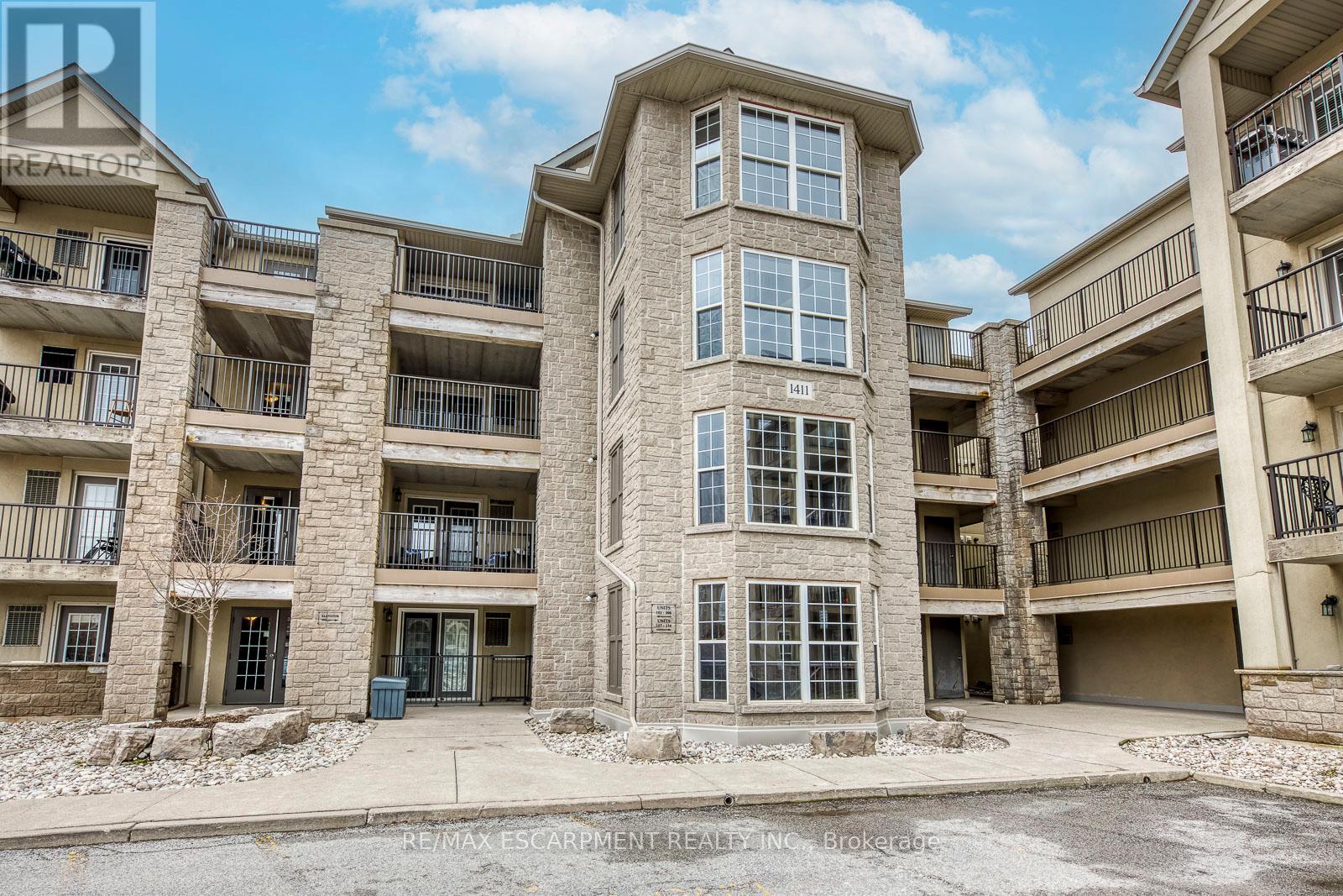 302 - 1411 Walkers Line, Burlington, Ontario  L7M 4P5 - Photo 3 - W12966894