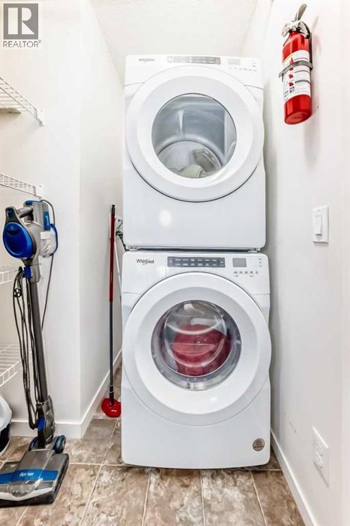 307 Auburn Bay Circle SE, Calgary, Alberta  T3M 1S6 - Photo 34 - A2286349