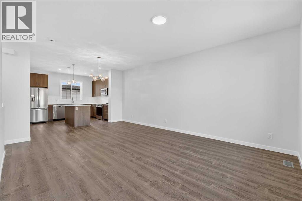 103, 40 Creekside Way Sw, Calgary, Alberta T2X 6E2 - Photo 4 - A2292968