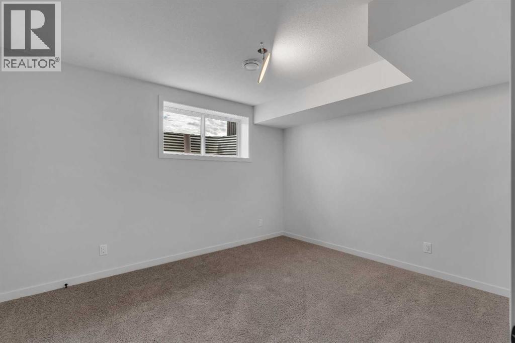 1497 Rangeview Drive SE, Calgary, Alberta  T3S 0K5 - Photo 33 - A2261439