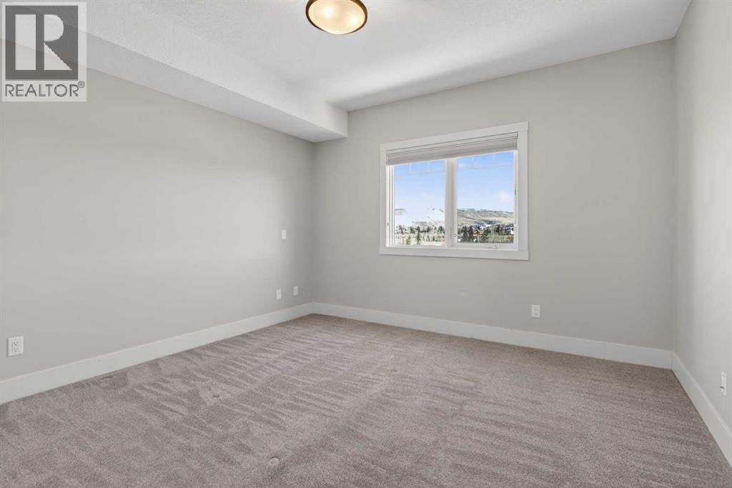203, 77 George Fox Trail, Cochrane, Alberta  T4C 0N1 - Photo 29 - A2295000