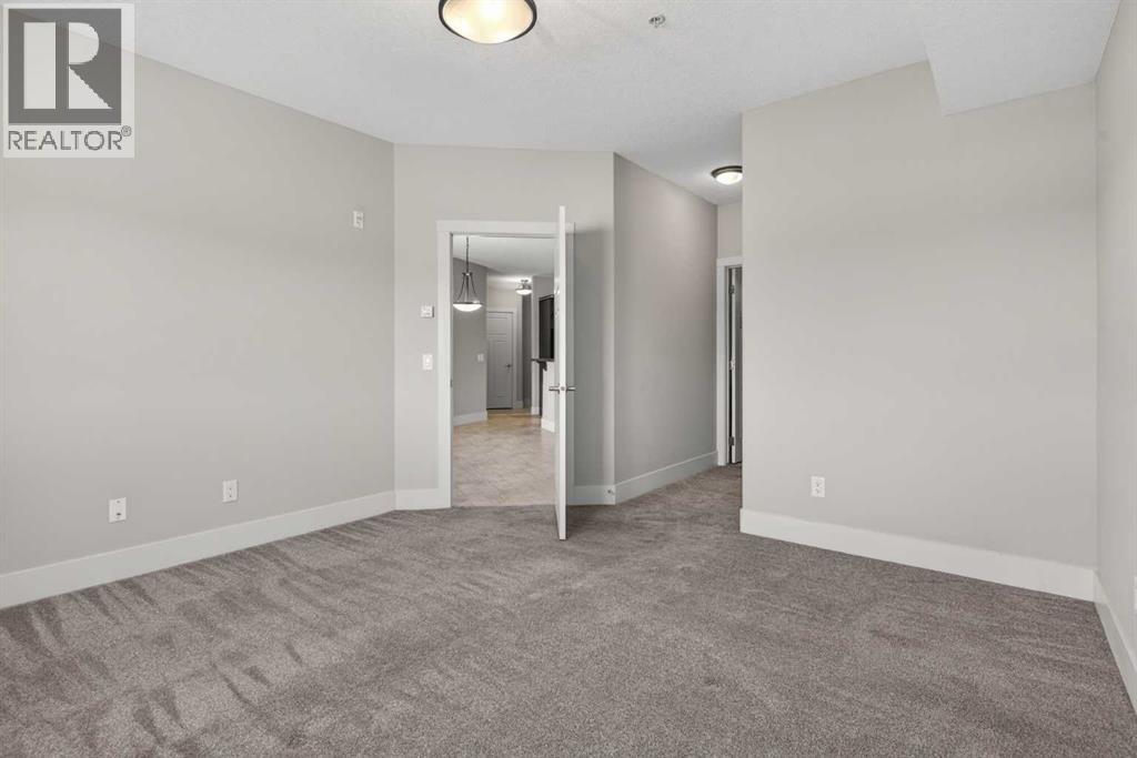 203, 77 George Fox Trail, Cochrane, Alberta  T4C 0N1 - Photo 30 - A2295000