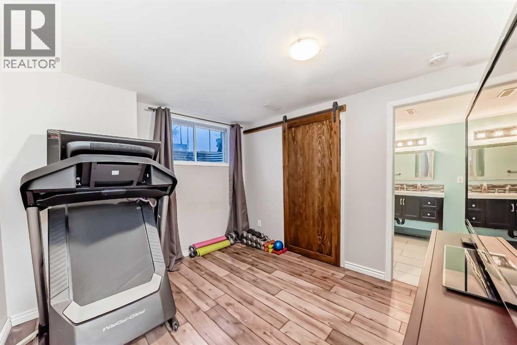 1020 Windsong Drive SW, Airdrie, Alberta  T4B 0P2 - Photo 40 - A2299470