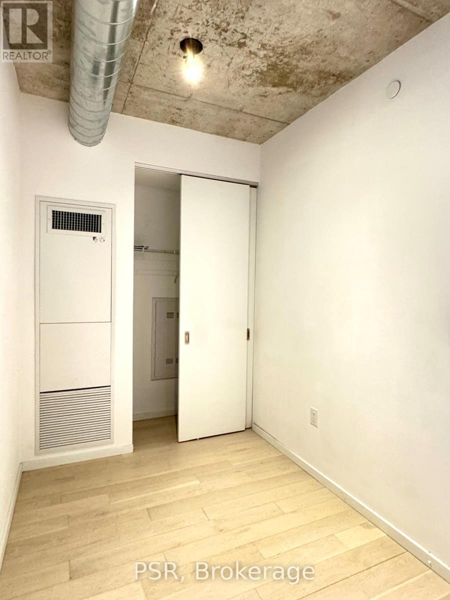 510 - 21 Lawren Harris Square, Toronto, Ontario  M5A 0T4 - Photo 2 - C12819336