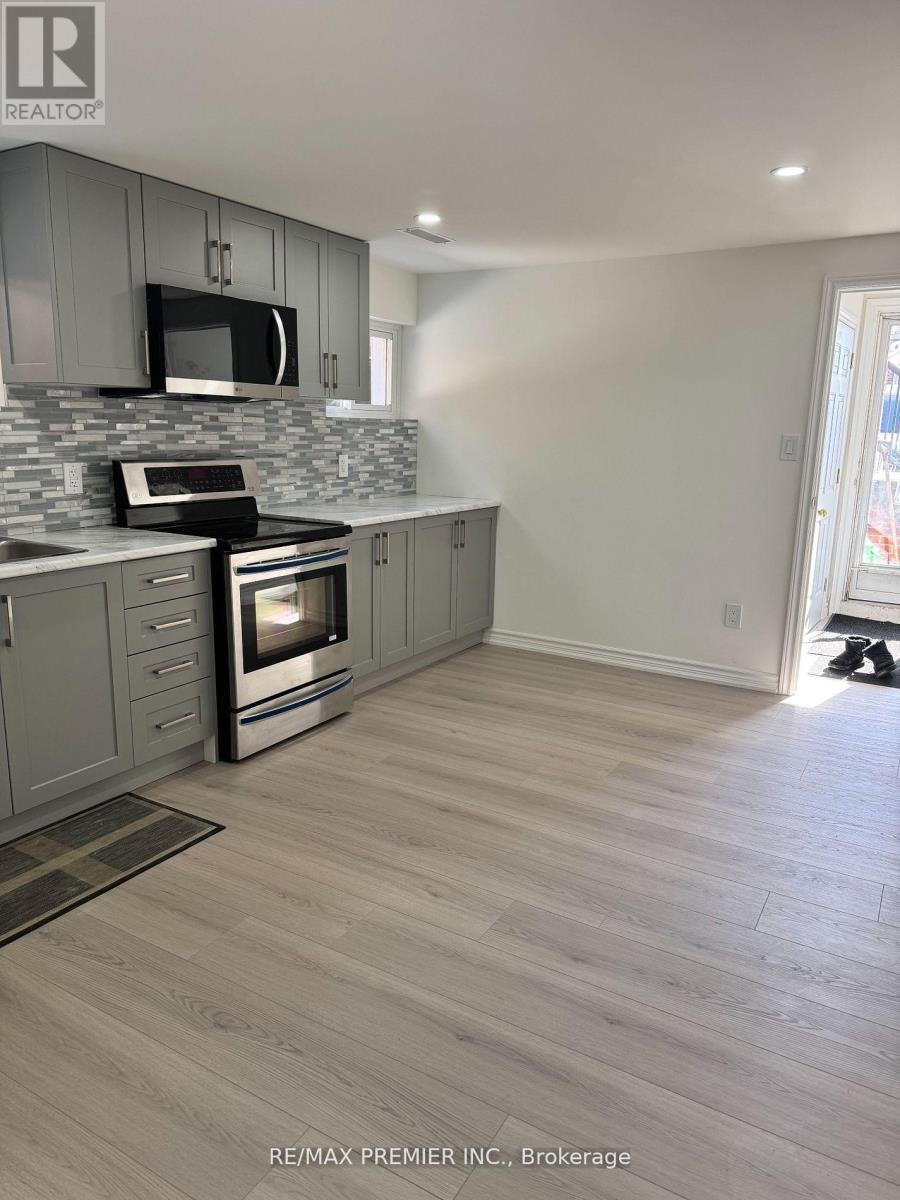 18 Madonna Gardens, Toronto, Ontario  M9L 2T4 - Photo 3 - W12967330