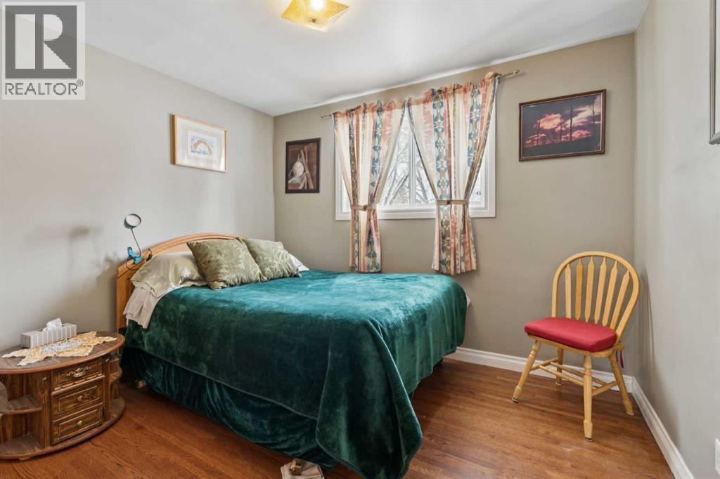 12 Westwood Crescent SW, Calgary, Alberta  T3C 2W6 - Photo 13 - A2298134